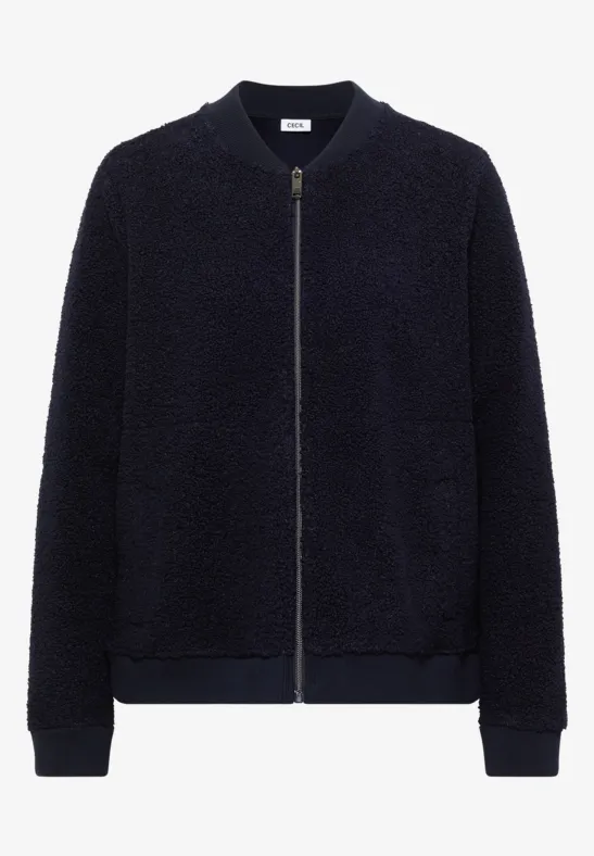 Kurz geschnittene, marineblaue Teddyfleece-Bomberjacke mit Reißverschluss und seitlichen Eingrifftaschen.