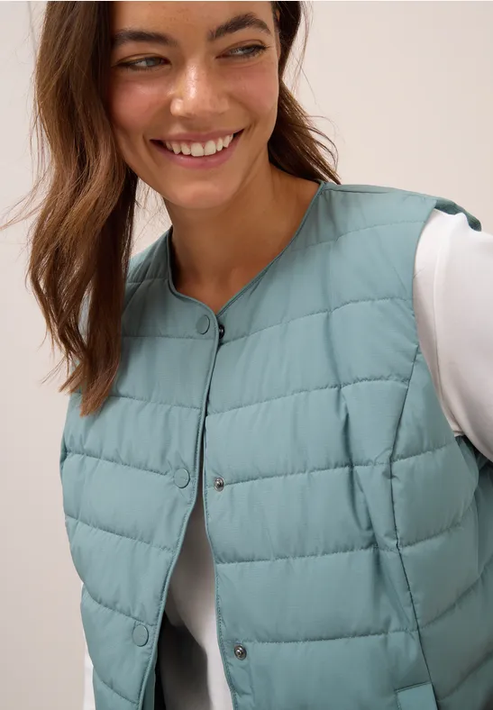 Vest om eronder te dragen ice hill green