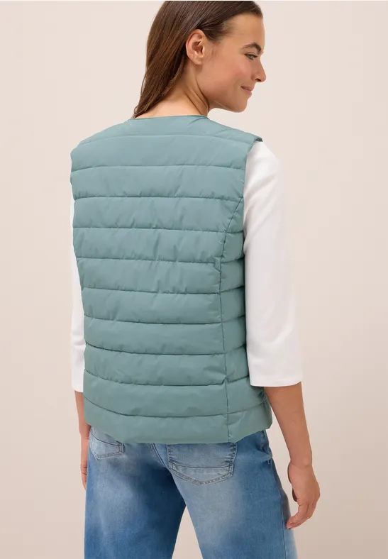 Vest om eronder te dragen ice hill green