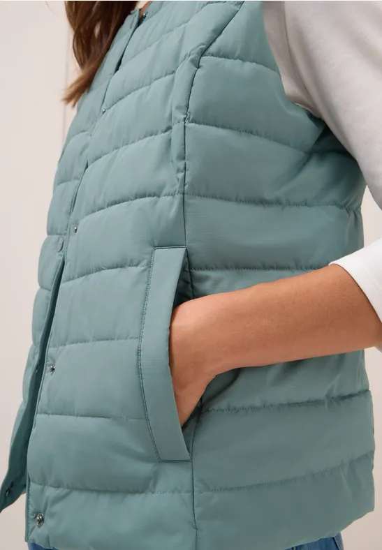 Vest om eronder te dragen ice hill green