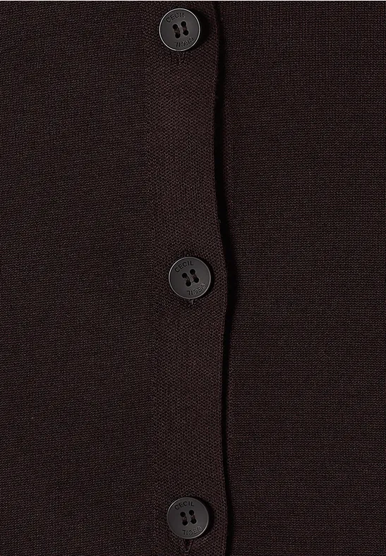 Dunkelbrauner Strickstoff mit drei schwarzen Knöpfen in einer vertikalen Reihe.