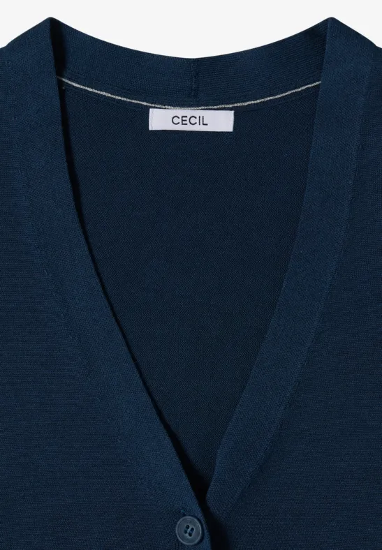 Navyblaues Damen-Strickjäckchen mit V-Ausschnitt und Knopfleiste, Markenlabel Cecil am Krageninneren sichtbar.