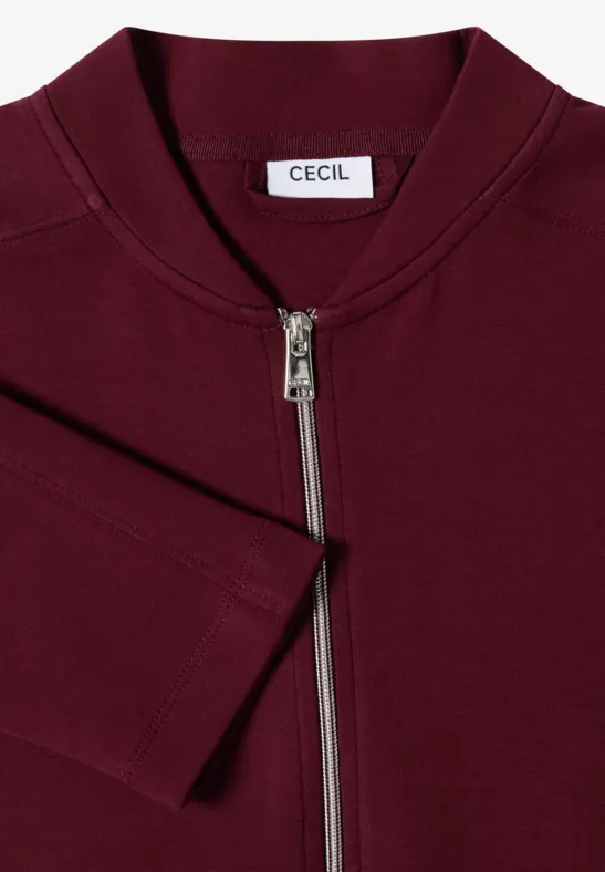 Bordowa kurtka typu bomber z srebrnym zamkiem i metką CECIL.