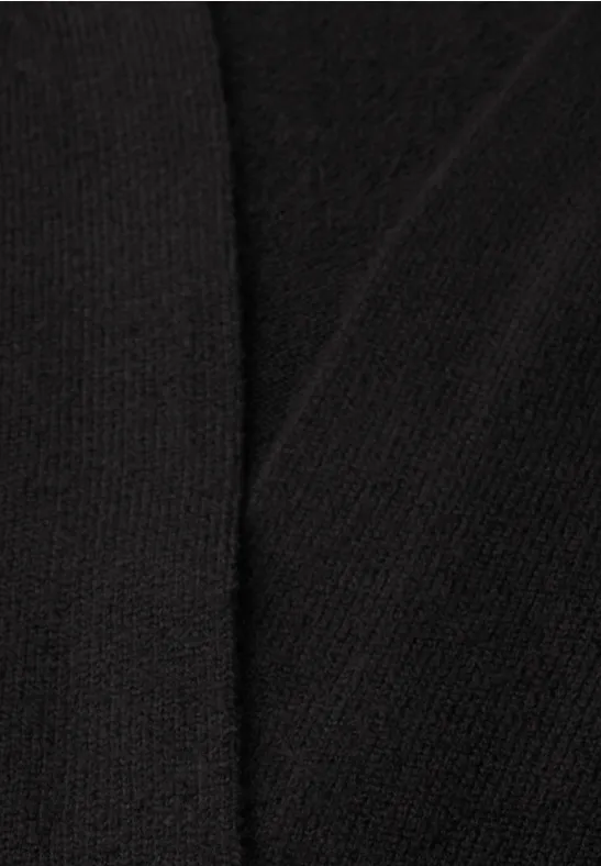 Schwarzer Stoff mit feinem Strickmuster
