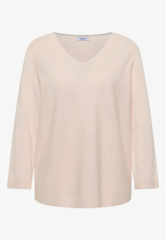 Beiger V-Ausschnitt-Pullover mit langen Ärmeln, lockerer Passform aus weichem Strick.