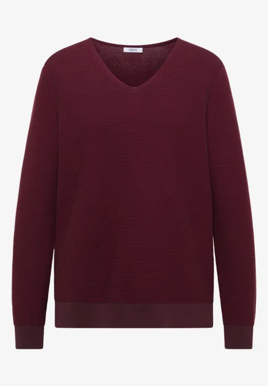 Un pull uni à encolure en V bordeaux, manches longues et finitions côtelées discrètes.