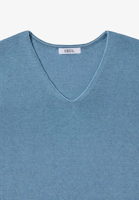 Pull bleu clair à col en V en maille fine