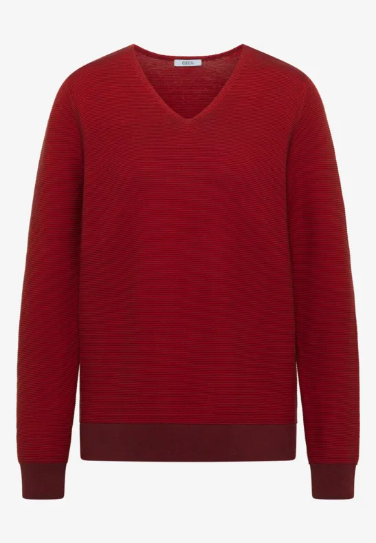 Pull col V rouge en tissu doux.