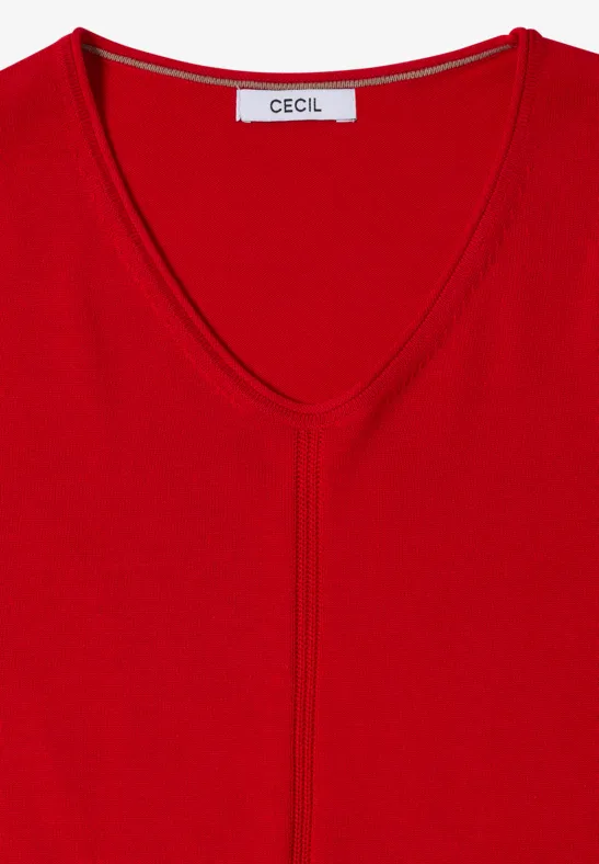 Ein rotes V-Ausschnitt-Shirt mit Label am Nacken.
