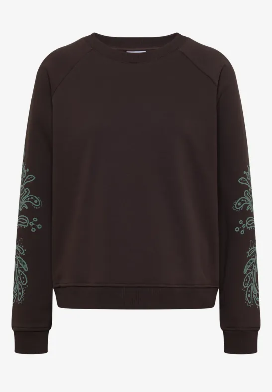 Schwarzes Sweatshirt mit Rundhalsausschnitt und filigratem grünem Muster an den Ärmeln.