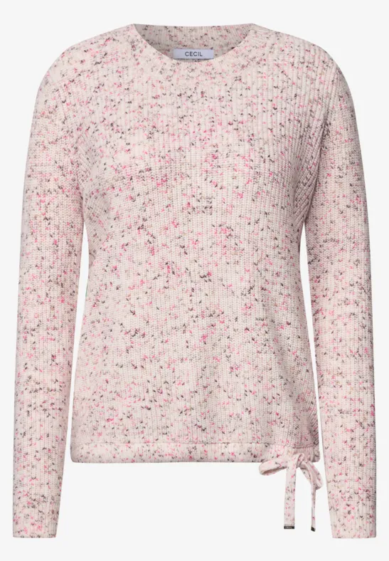 Hellrosa Pullover mit bunten Sprenkeln, rundem Ausschnitt und Zierschleife an der Seite.