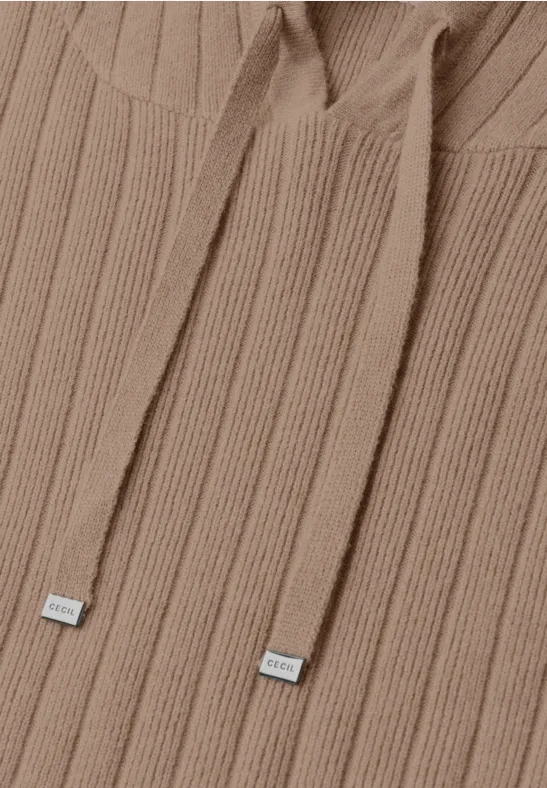 Sweat à capuche beige côtelé avec cordons et embouts métalliques argentés.