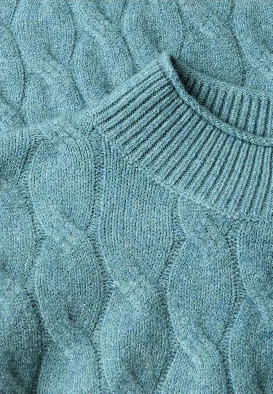 Pull tricoté turquoise à torsades, col montant, doux et confortable.
