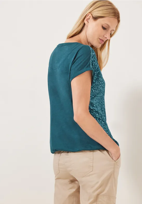 T-shirt van materiaalmix deep lake green