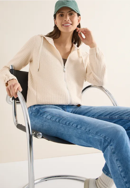 Jas met capuchon en structuur pearl beige