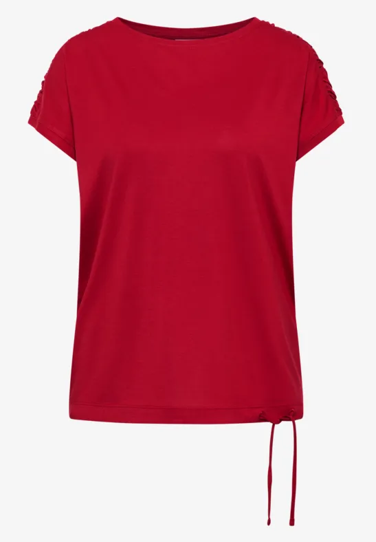 Rotes T-Shirt mit kurzen Ärmeln und seitlicher Bindeschleife am Saum.