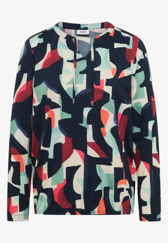Bunte Bluse mit abstraktem Grafikmuster in Rot, Grün und Blau, langärmelig und gerader Schnitt.