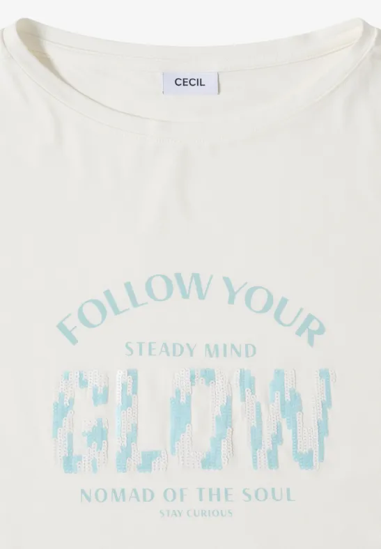 Wit T-shirt met opdruk 'FOLLOW YOUR STEADY MIND', pixelgrafiek en tekst 'NOMAD OF THE SOUL'