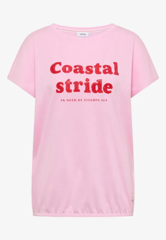 Roze T-shirt met rode tekst "Coastal stride in need of vitamin sea"