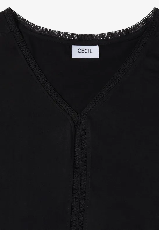 Zwart shirt met V-hals en CECIL-label.