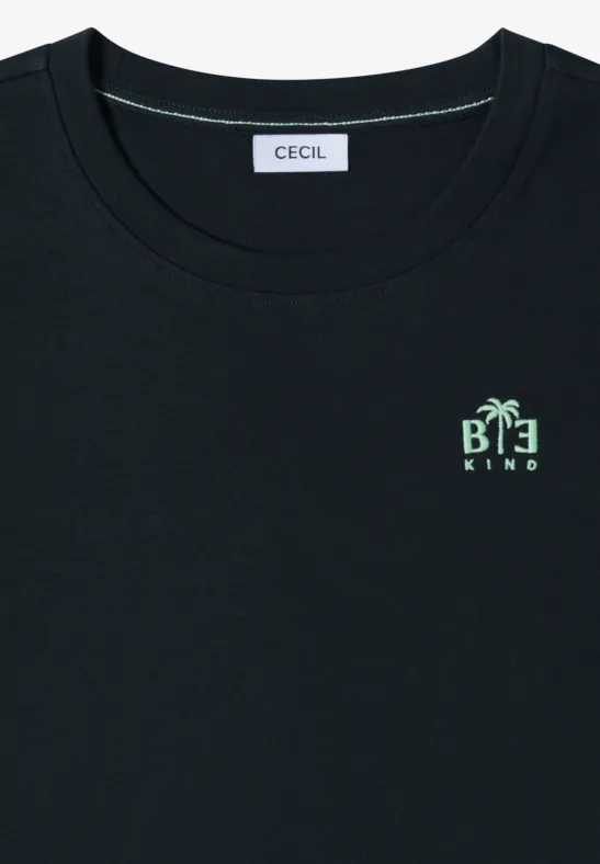 Zwart CECIL crewneck T-shirt met klein groen “BE KIND”-print en palmboom-icoon.