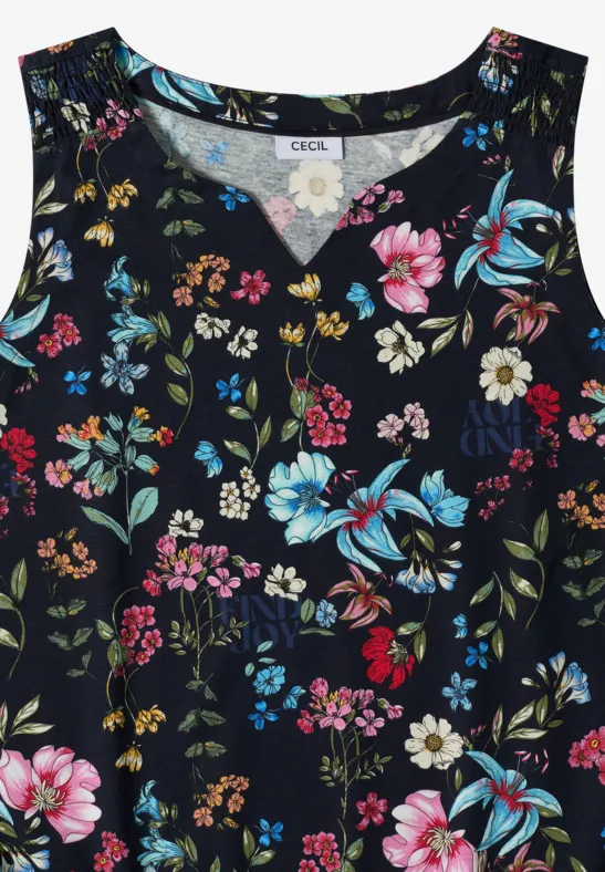 Débardeur femme sans manches à motif floral coloré sur fond sombre.