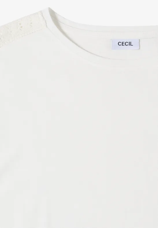 Weiße Damen-Tunika mit Rundhalsausschnitt, Spitzen-Detail am Schulterbereich und CECIL-Label im Nacken.