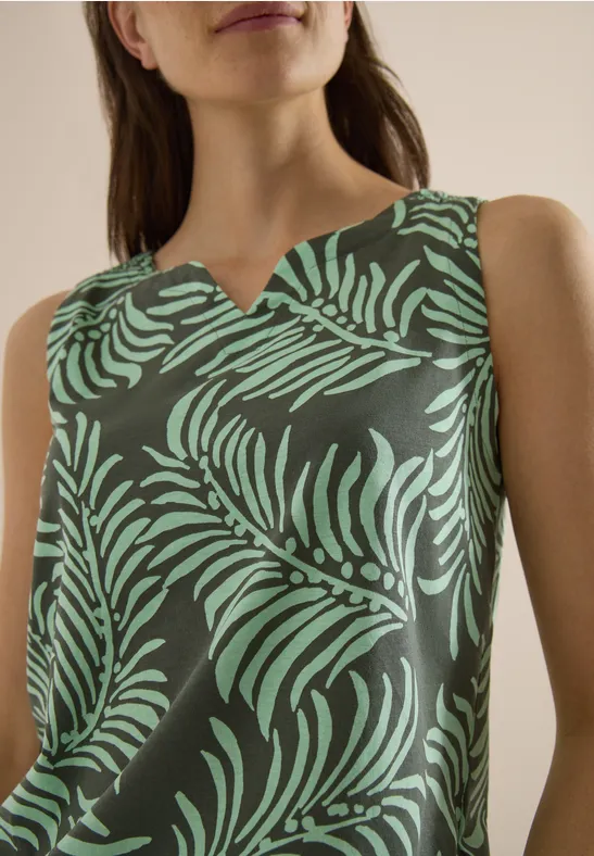Mouwloze top met groen bladmotief