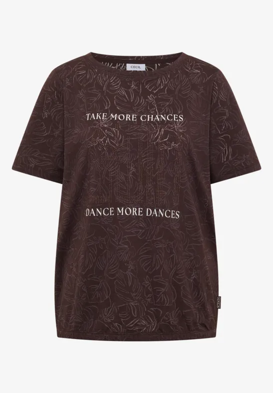 Braunes T-Shirt mit floralen Mustern und weißem Text „Take more chances, dance more dances.“