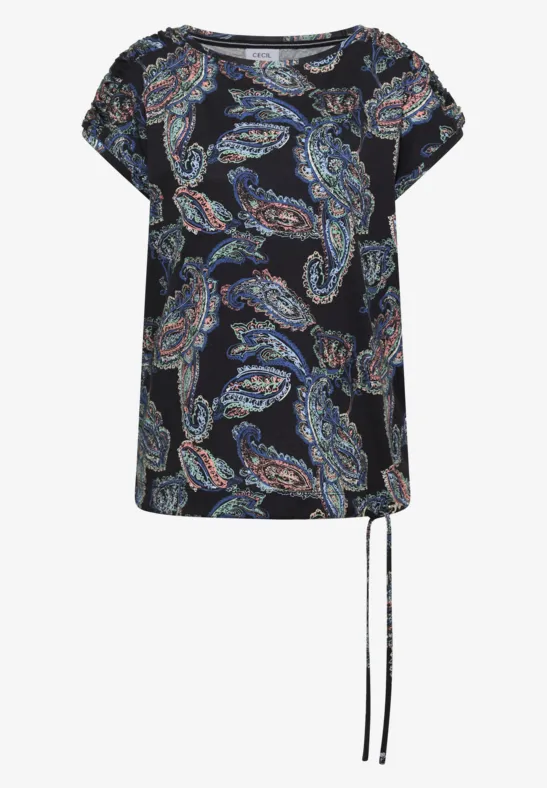 Schwarze Kurzarm-Bluse mit buntem Paisley-Muster und lockerem Schnitt, seitlicher Kordelzug am Saum.