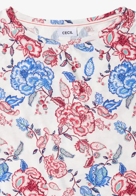 Witte top met rood-blauw bloemenpatroon