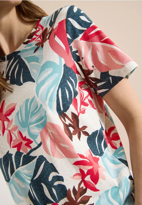 Damen-T-Shirt mit kurzem Arm und tropischem Blumen- und Blattmuster in Rosa, Türkis und Marineblau.