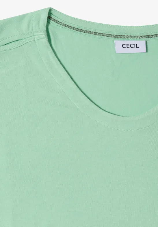 T-shirt vert à col rond avec étiquette Cecil au niveau du col.