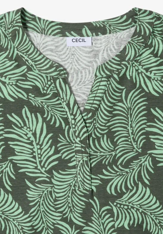 Chemisier vert à motif de fougères vert clair, encolure en V, marque CECIL.