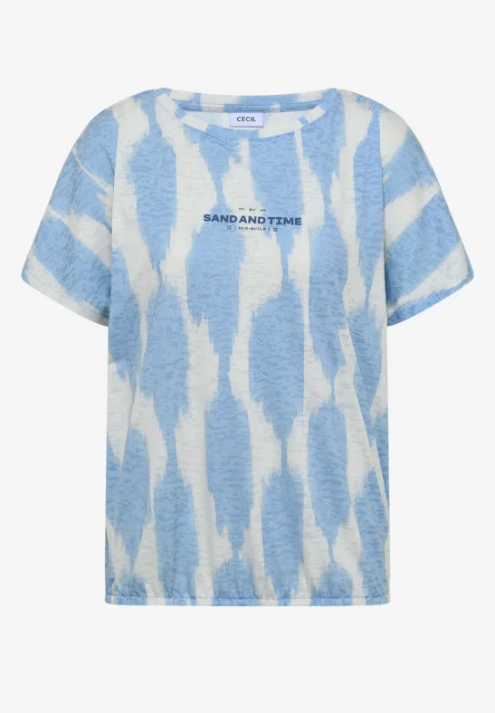 T-shirt ample à manches courtes avec motif abstrait bleu et blanc.