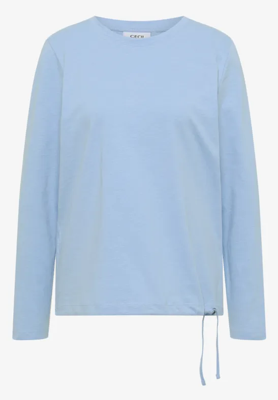 T-shirt à manches longues bleu clair avec encolure ronde et cordon de serrage sur le côté.