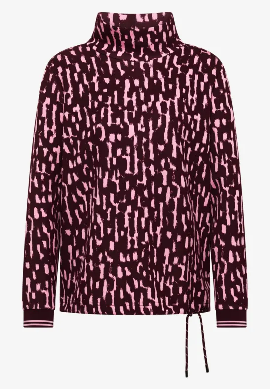 Rollkragenpullover mit dunkelrotem Grund, rosa abstraktem Tupfenprint und seitlichem Tunnelzug
