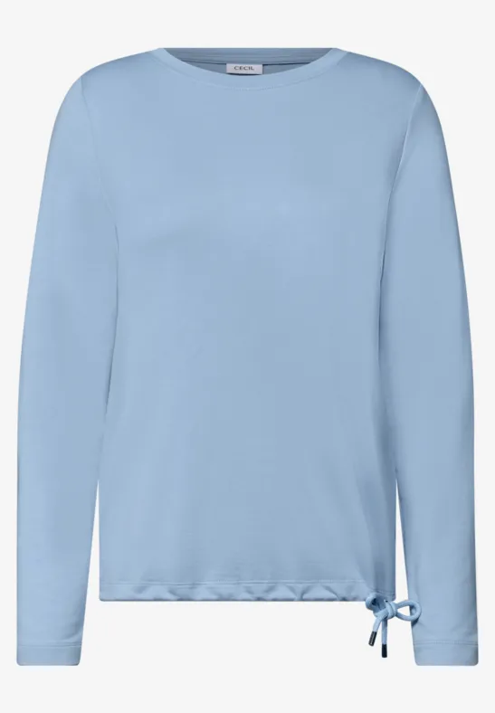 Hellblaues Langarmshirt mit Rundhalsausschnitt und seitlicher Schleife.