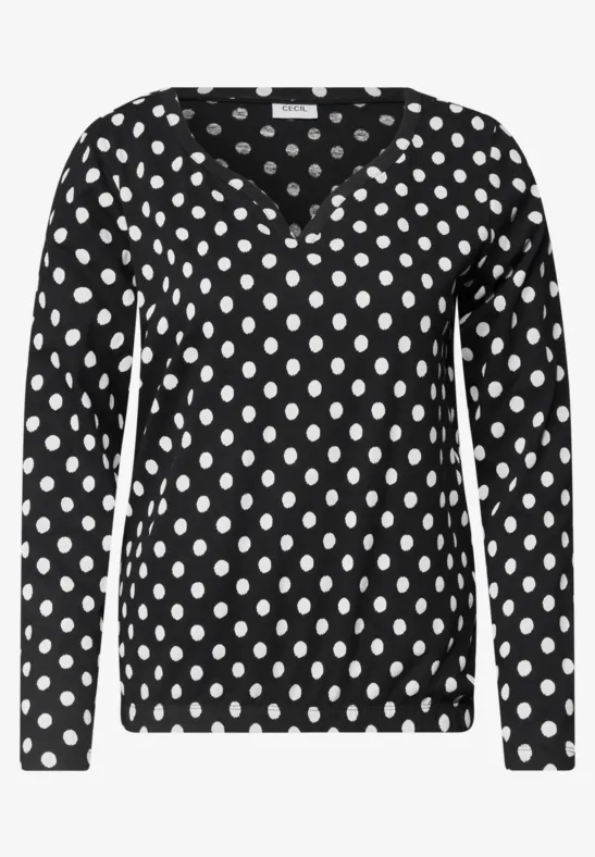 Schwarzes Langarmshirt mit weißen Punkten und V-Ausschnitt.