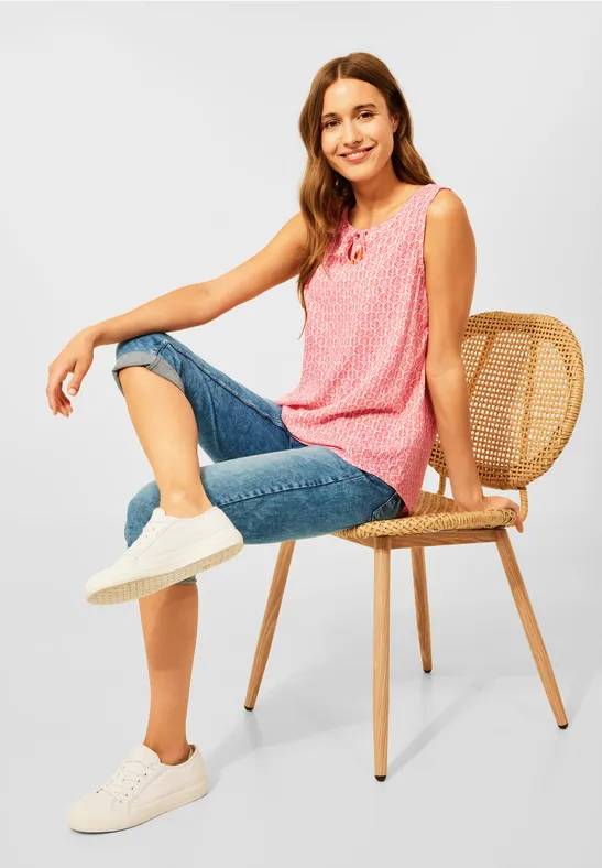 Blousetop met patroon sunset coral
