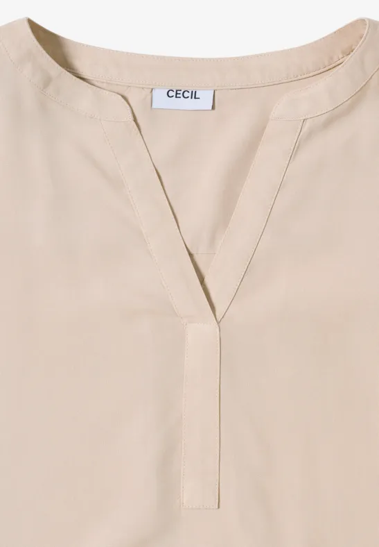 Blouse in effen kleur oat milk beige