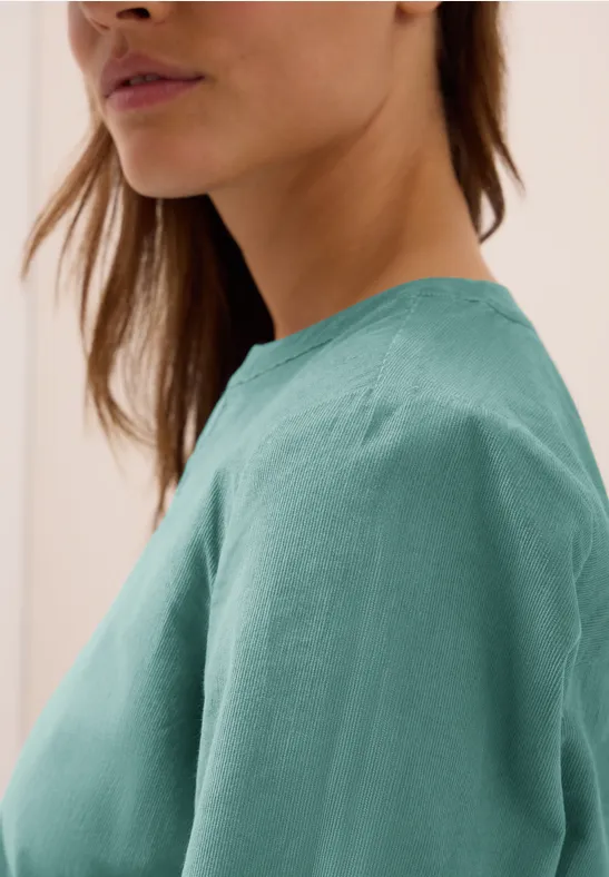 Corduroy blouse met gespleten hals jewel green