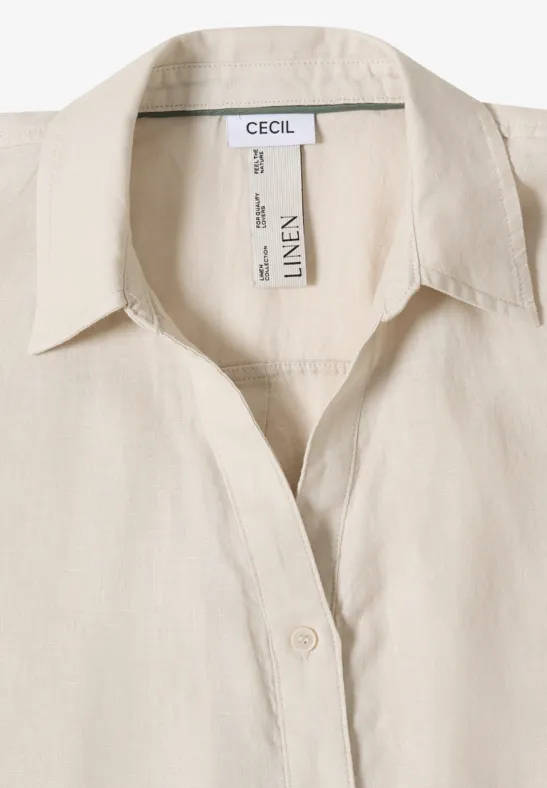 Beige Leinen-Hemd mit Kragen und Knopfleiste, schlicht und leicht.