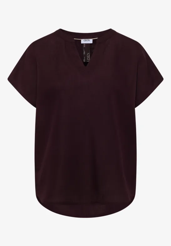 Damenbluse in dunklem Beerenton, kurzärmelig, V-Ausschnitt und lockerem Schnitt.