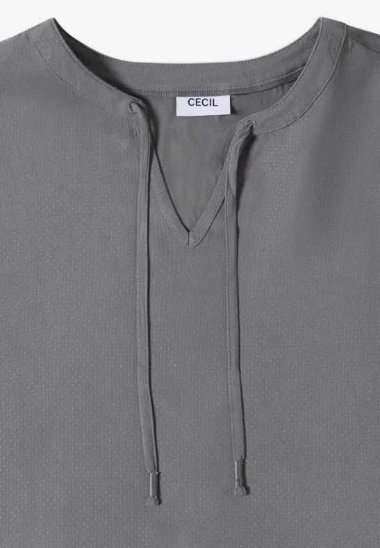 Graues Damen-Shirt mit V-Schlitz und Kordelzug am Rundhals, mit Markenlabel 'CECIL'.