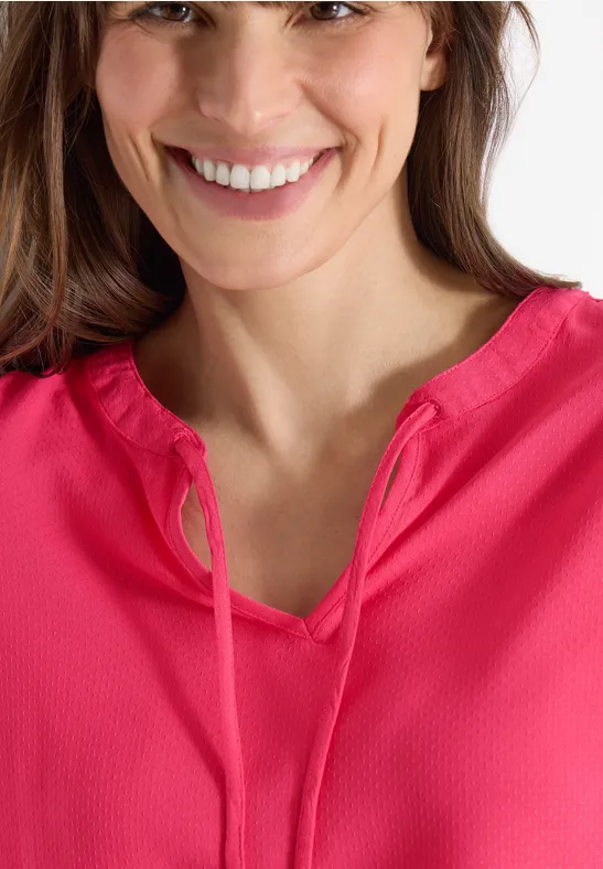 Blouse à manches courtes avec mélange de structures geranium red