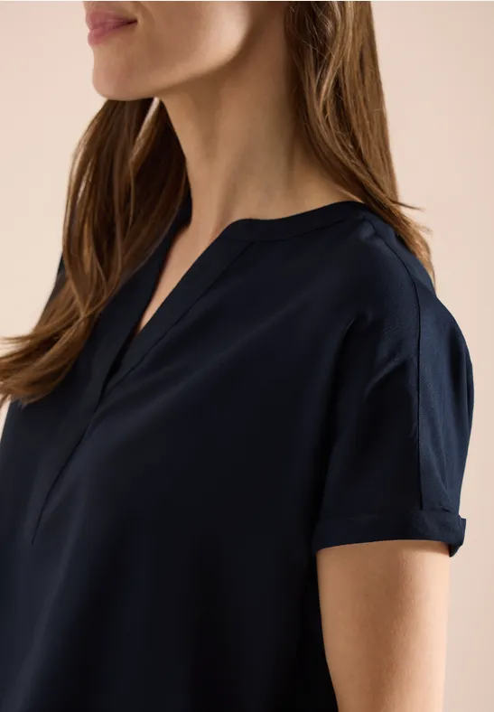 Blouse met korte mouwen en gespleten hals universal blue