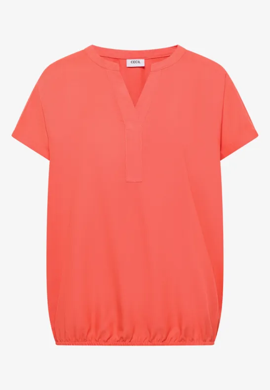 Korallfarbenes Damen-Shirt mit kurzen Ärmeln, V-Ausschnitt und elastischem Saum.