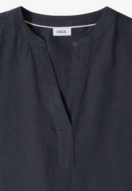 Schwarze Bluse mit V-Ausschnitt und Label 'CECIL'.