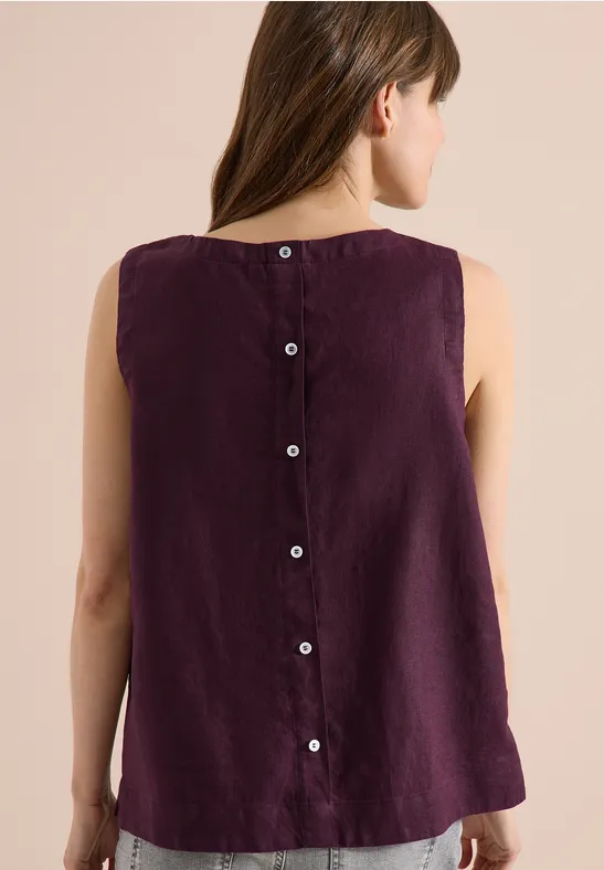 Ärmelloses, locker geschnittenes Top aus Leinen in dunklem Lila mit durchgehender Knopfleiste am Rücken.